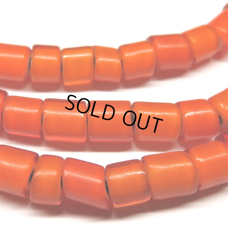 オレンジ色チューブ型ホワイトハーツ連